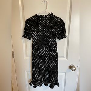 Polka dot dress, ruffle trim, button on back of the neck, keyhole back